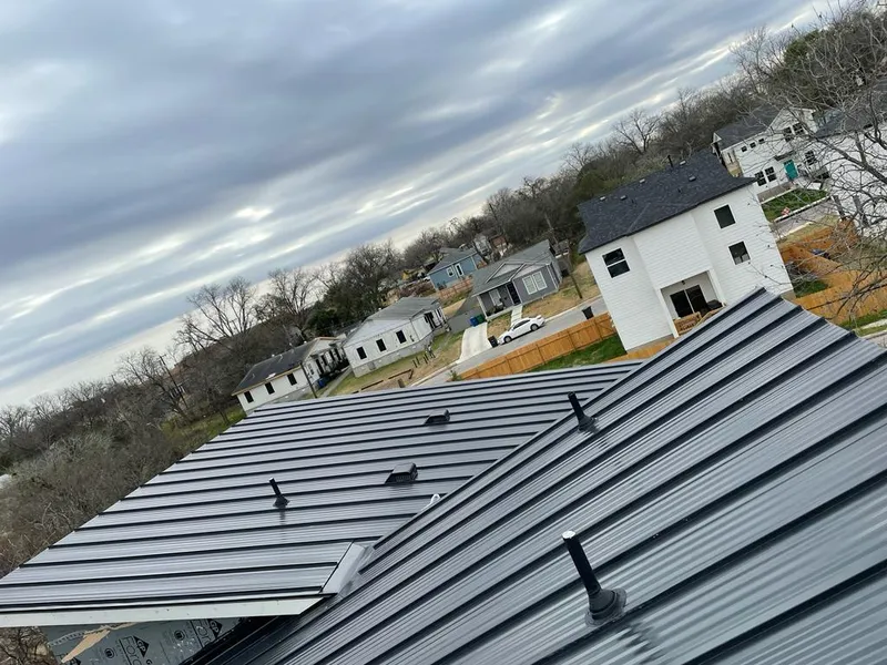 Standing seam metal roof panels with vents for Skylight Repair in Falls Church